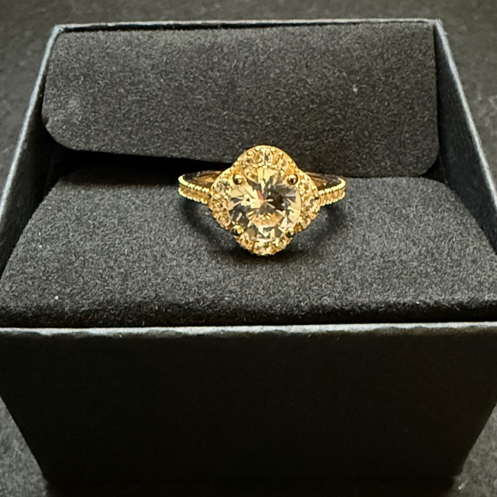 Radiant Gold Ring with Sparkling Stone